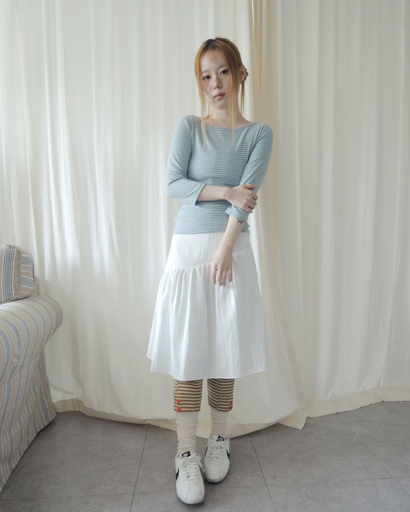 SLOW BUTTON FLARE MIDI SKIRT