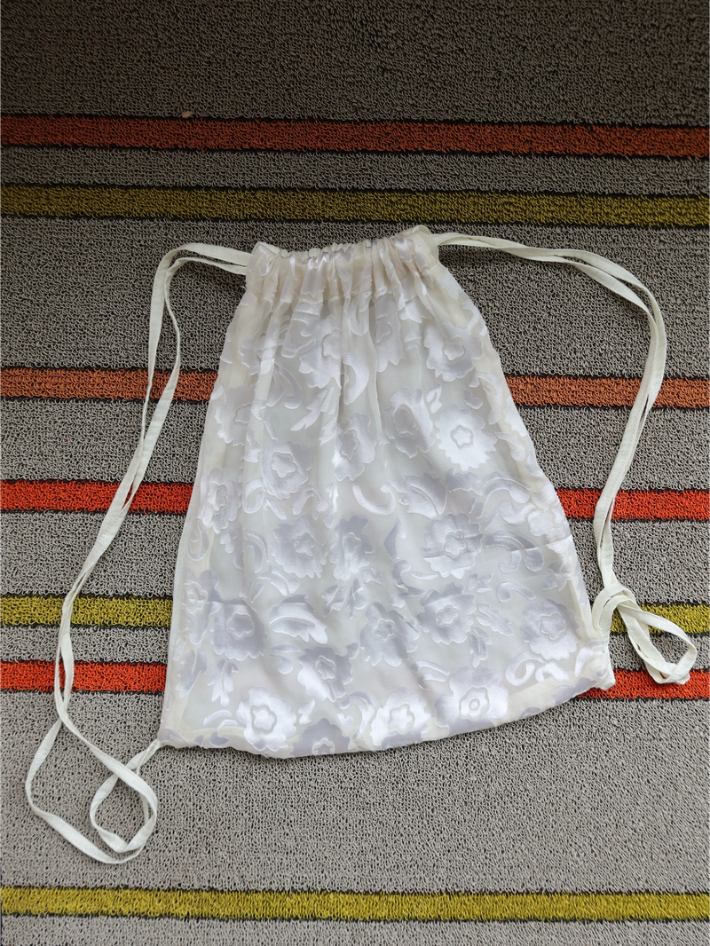 Sheer flower silk string bag