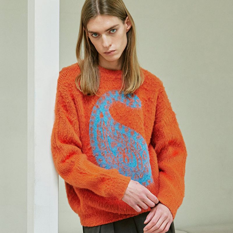 KND（ケイエンド）の「BULKY BRUSH PAISLEY SWEATER ORANGE（Tops）」
