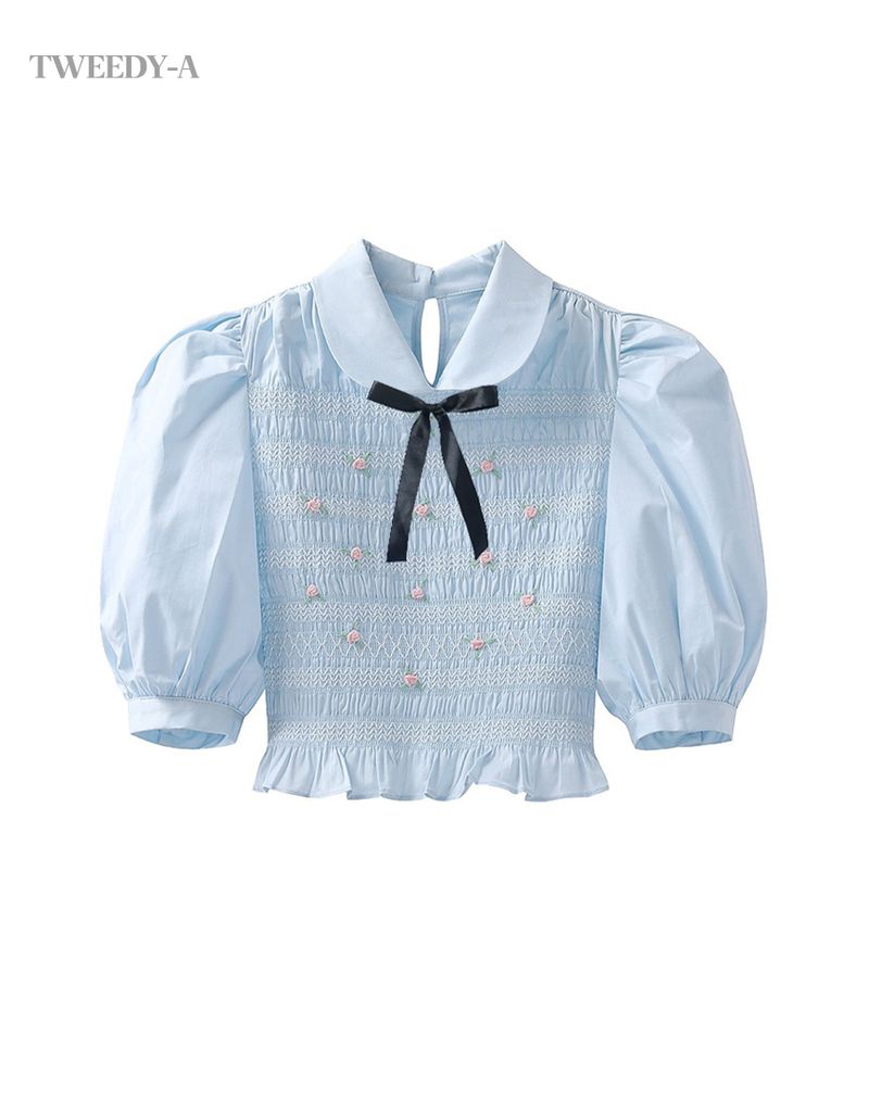 TWEEDY-A（ツウィーディア）の「Puff short sleeve cropped blouse sky blue（Tops）」