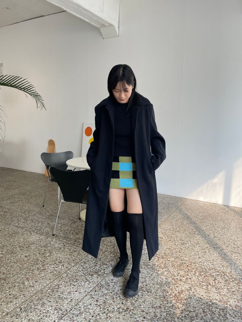 Checkerboard knit mini skirt