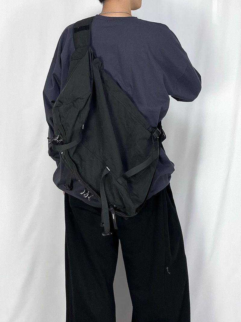 Velcro over sling-bag