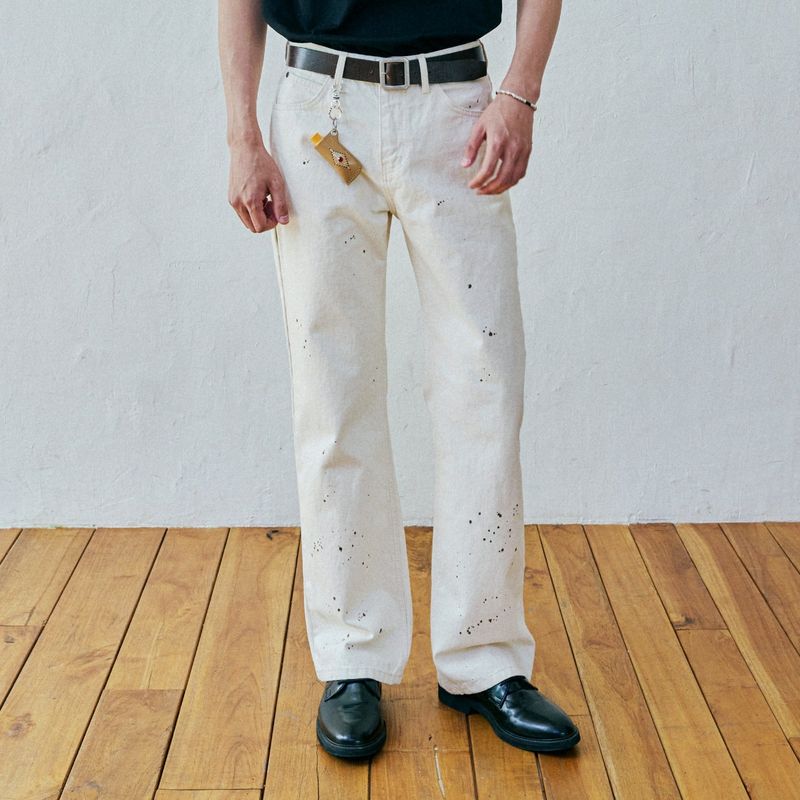 97 lc splatter bootscut denim pants ecru