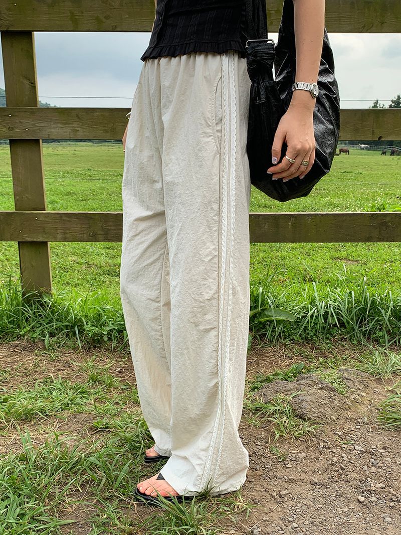 [MADE] Rollton nylon lace track bendable pants