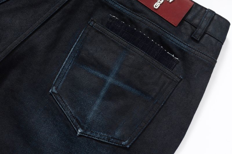 COATED KNIFE-SCRAPED HAND-WIPED DISTRESSED BOOTCUT JEANS