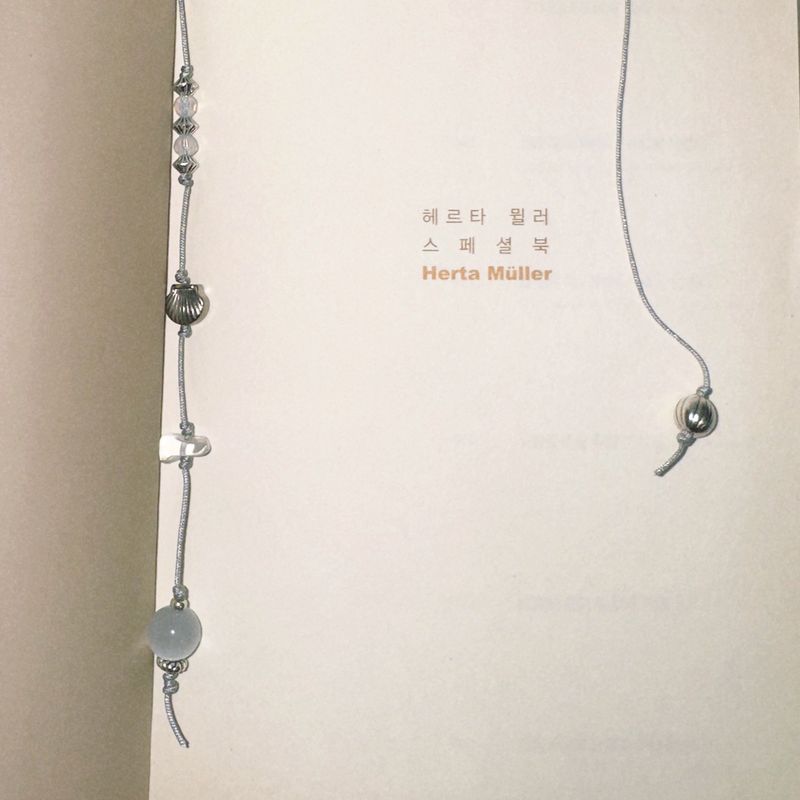 silver shell bookmark