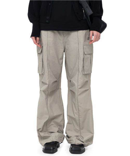 IUGAMAKARAS（イウガマカラス）の「Line Cargo Pants (Beige)（Pants）」