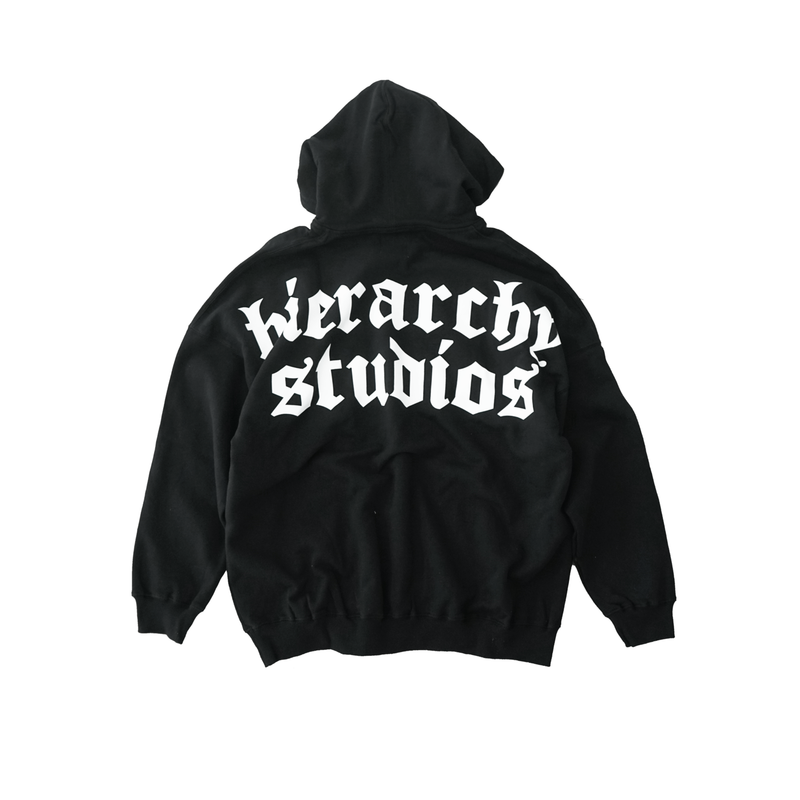 Hierarchy Studios（ヒエラルキースタジオ）の「Hierarchy Studios - ブラックワイドロゴオーバーサイズフーディー（トップス）」