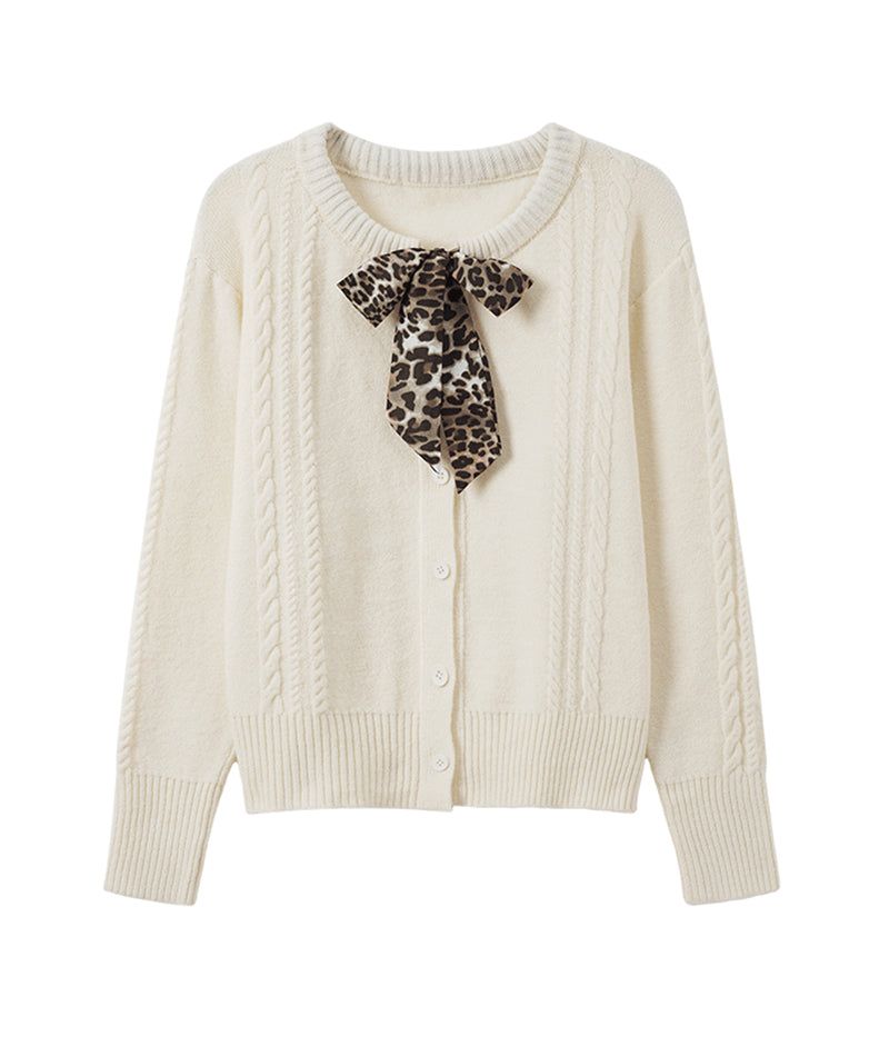 Cozy&Kitsch（コージーアンドキッチ）の「Leopard Ribbon Knit Cardigan（Tops）」
