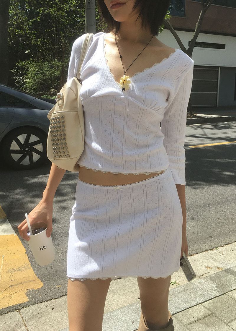 PINTER PUNCHING MINI SKIRT (2color)