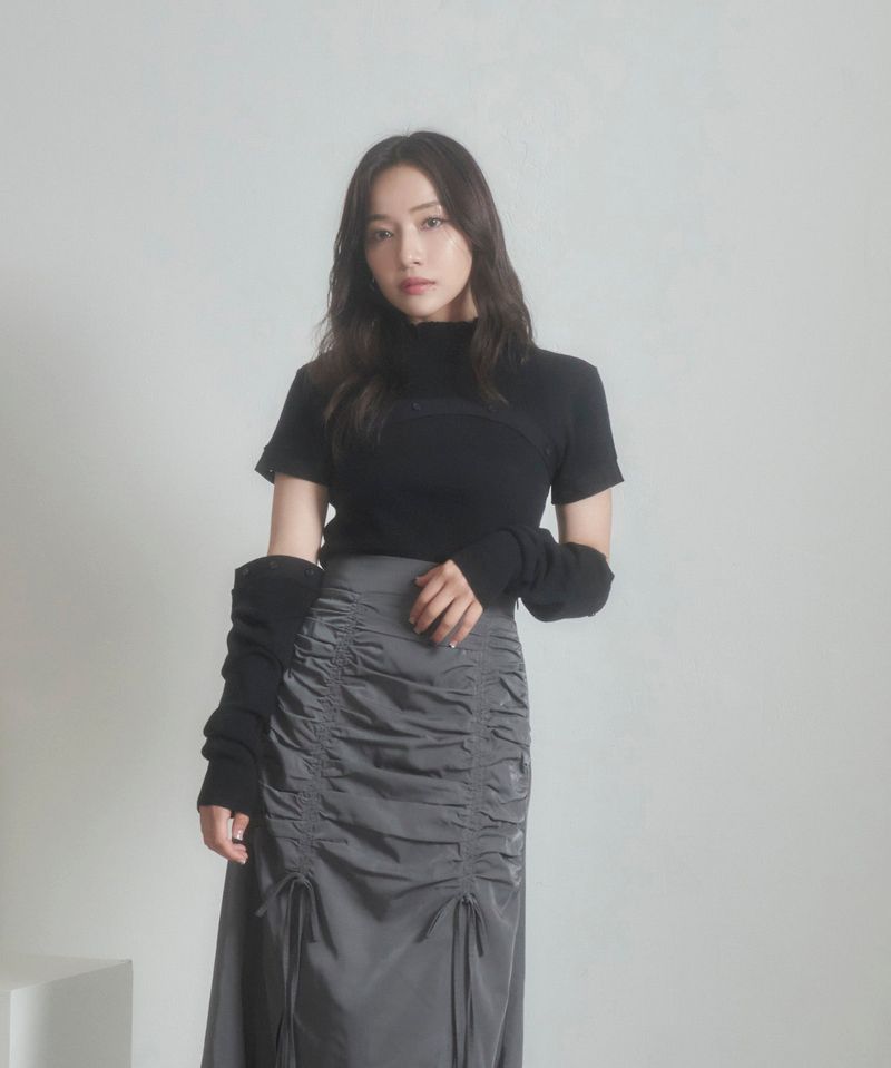 ANDGEEBEE（アンジービー）の「ボタンニットトップス（Tops）」