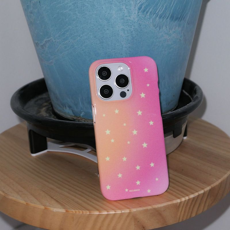 nullbieve（ヌルビーブ）の「スターリーナイトハードケース. ピンクオレンジ（スマホグッズ/小物）」