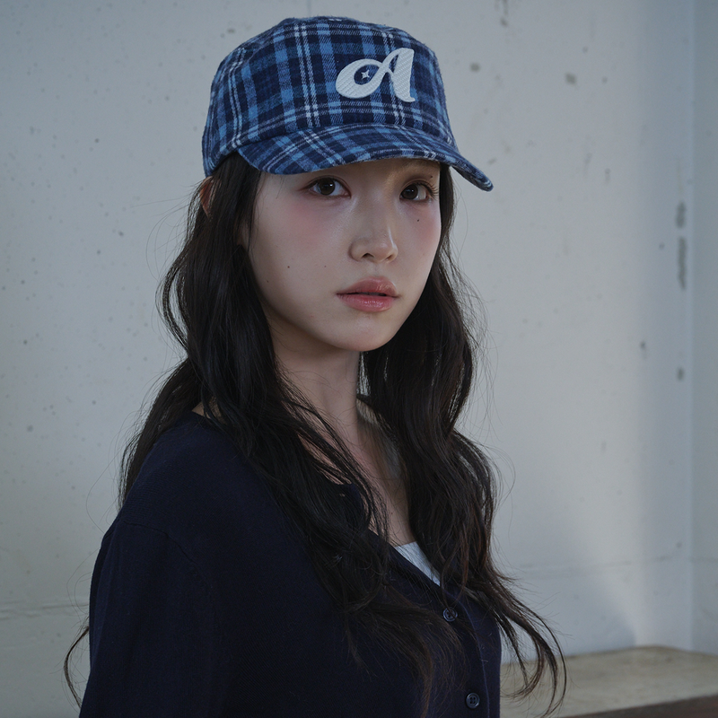ALLINCOMPLETE（オールインコンプリート）の「Aロゴ チェック ピルボックス キャップ (Navy Check)（帽子）」