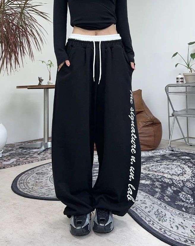 SATIIIZ（サティーズ）の「Muel Layered Embroidered Training Pants（Pants）」
