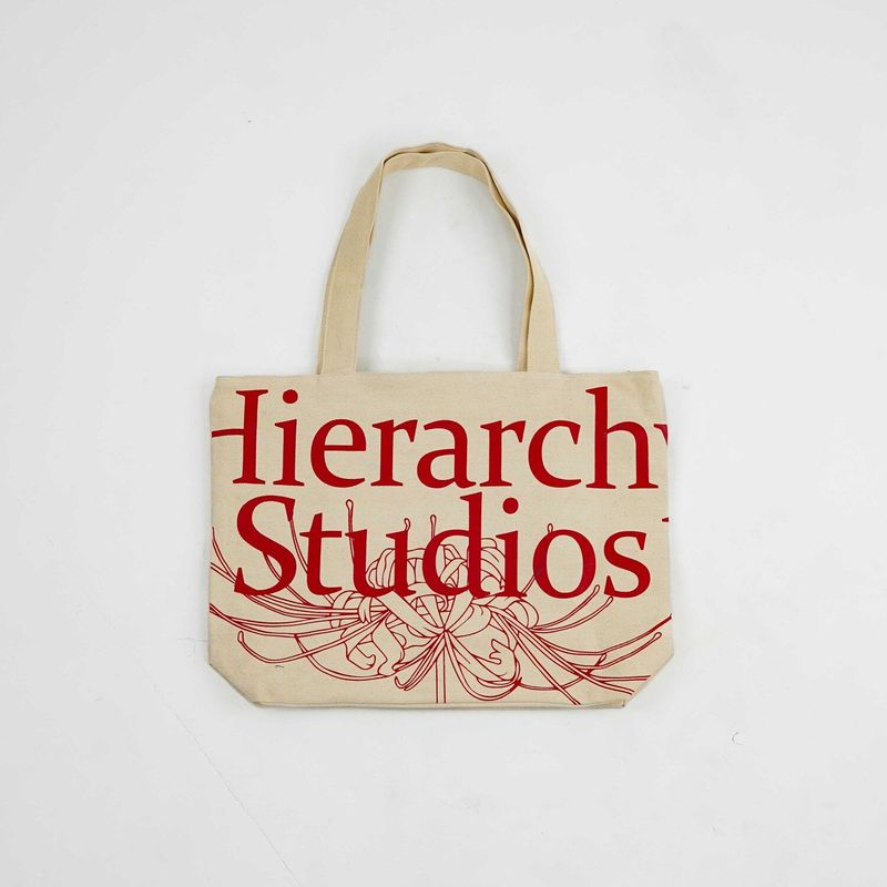 Hierarchy Studios（ヒエラルキースタジオ）の「Hierarchy Studios - アイボリーワイドスパイダーリリートートバッグ（バッグ）」