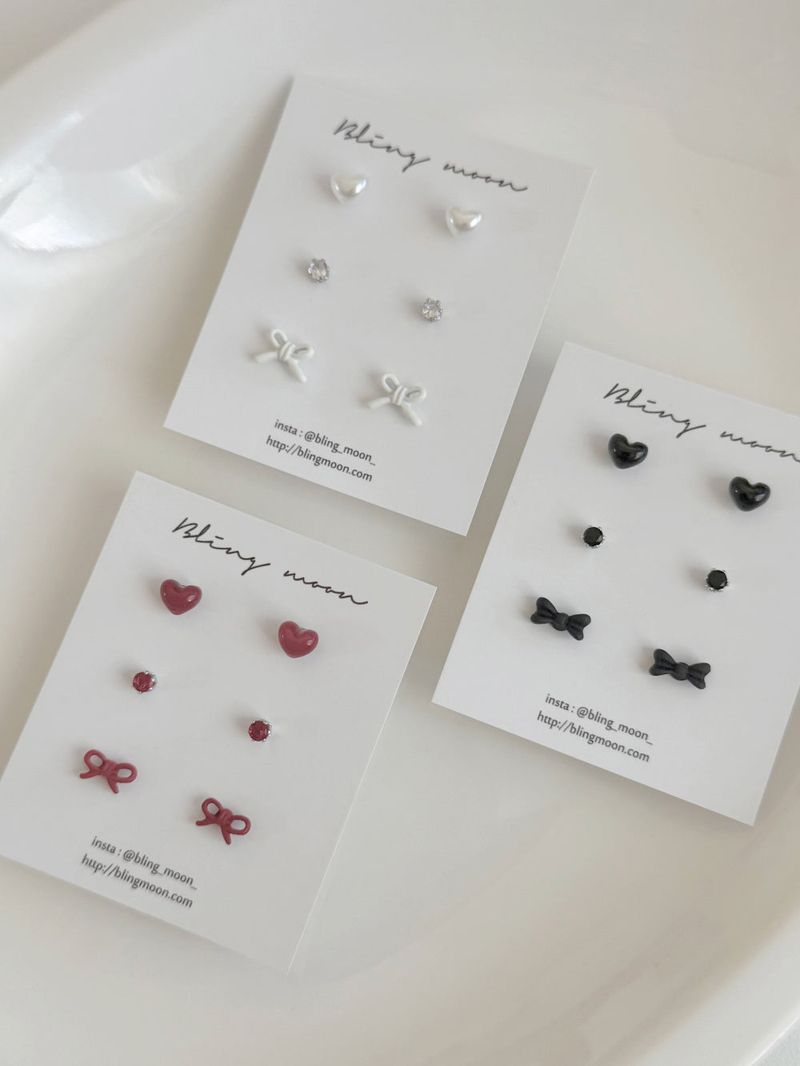 Blingmoon（ブリングムーン）の「[3 set] Berry Mood Ribbon Heart Earrings Set（Accessories）」