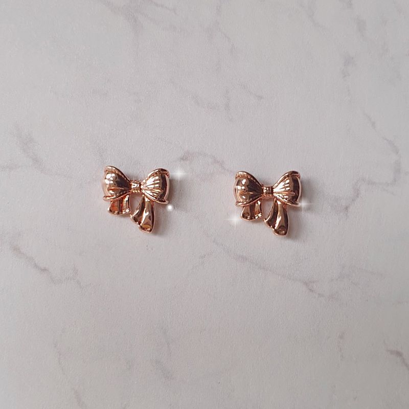 aimelbie（アイメルビー）の「Petit Daily Ribbon Piercing - Rosegold Color（Accessories）」