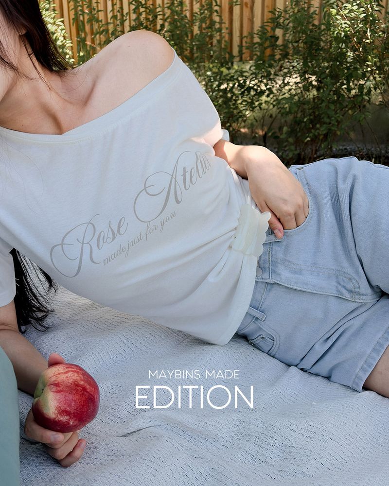 MAYBINS（メイビンス）の「MADE. Blur lettering off‑shoulder T‑shirt（Tops）」