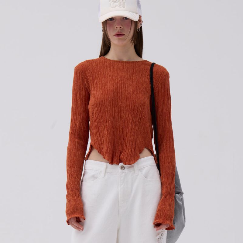 AACA（アカ）の「クリーストップ Orange（トップス）」