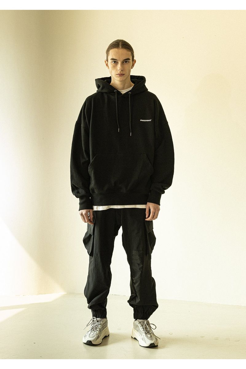MASSNOUN（マスノウン）の「SMILE OVERSIZED HEAVY HOODY（Tops）」