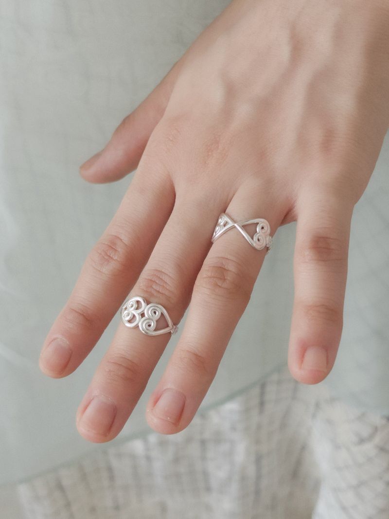 PAIR OF LOVE（ペアオブラブ）の「パリス ハート ローリング リング（アクセサリー）」