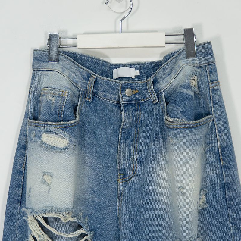 Destroyed brush denim pants