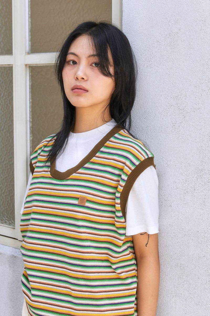 ALARMSEOUL（アラームソウル）の「ALARM マルチストライプテリーベスト_WOMAN（トップス）」