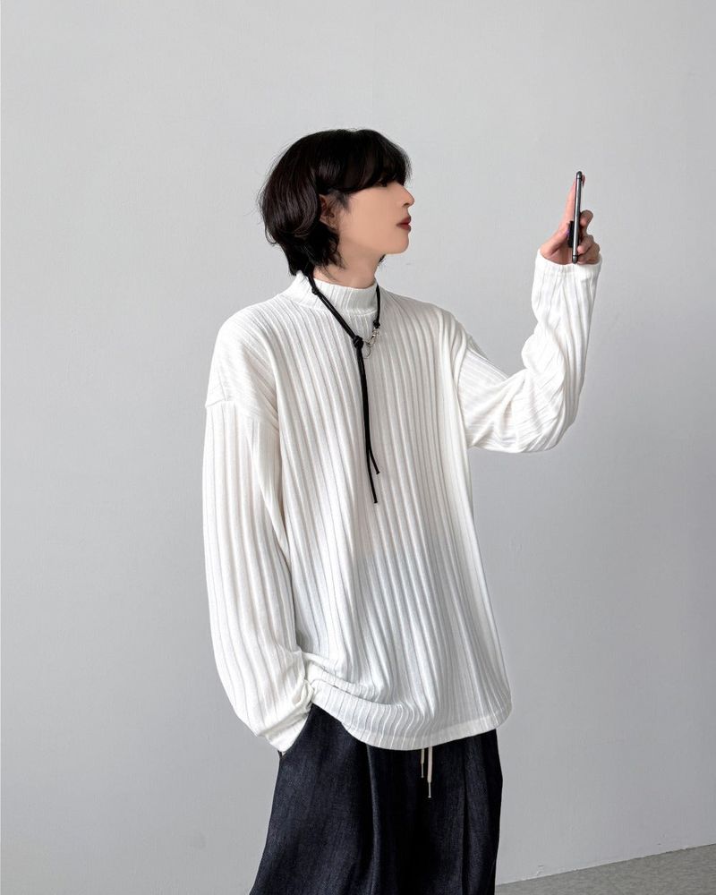 YOURNUS（ユアナス）の「Groove Half Neck Long Sleeve（Tops）」