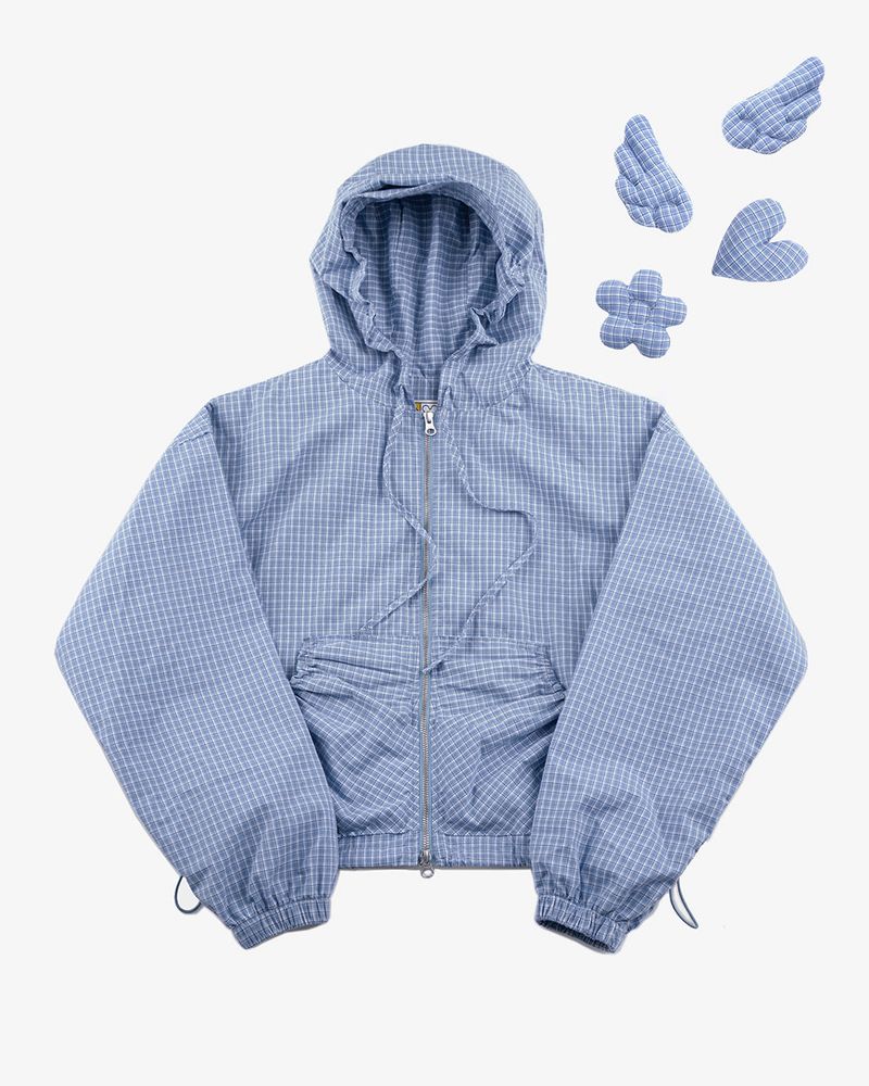 UNSTEADYMARKET（アンステディマーケット）の「Check Brooch Windbreaker Skyblue（Jackets/Outerwear）」