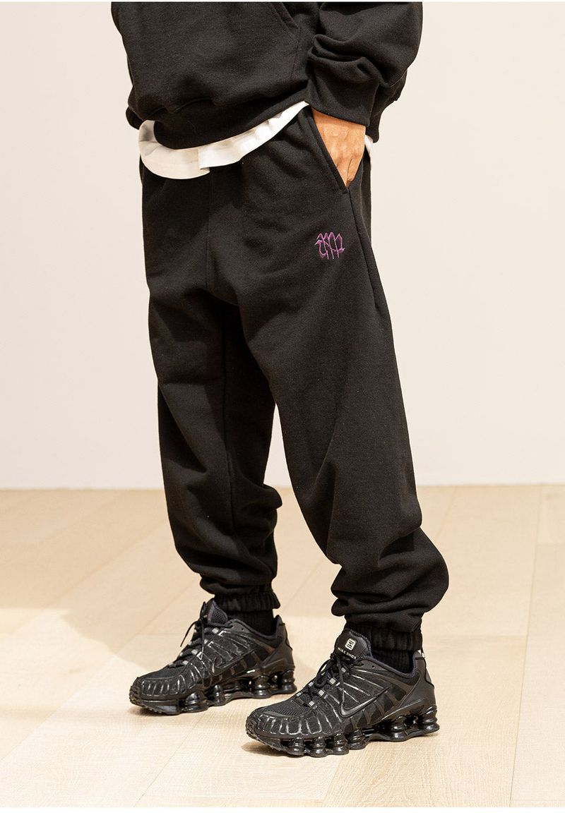 GRATING EMBLEM BACK SLIT ZIP PANTS