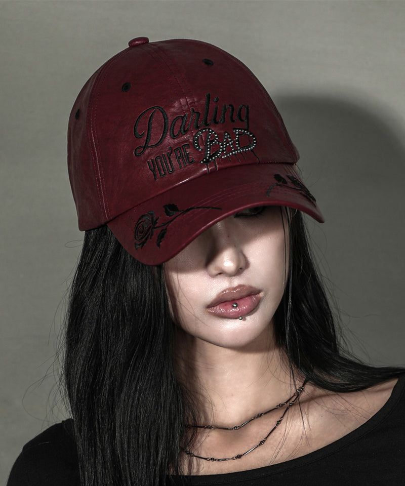DARLING, YOU ARE BAD（YOU ARE BAD）の「DYB レザーボールキャップ #ワイン（帽子）」