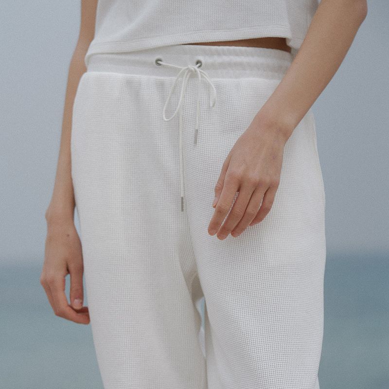 URAGO（ユラゴ）の「Waffle jogger pants（Pants）」