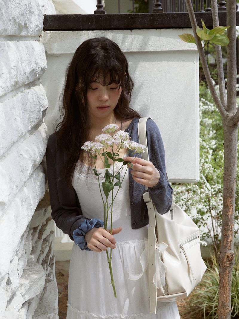 ovuni（オーブニ）の「Pillow ribbon bag_cream（Bags）」