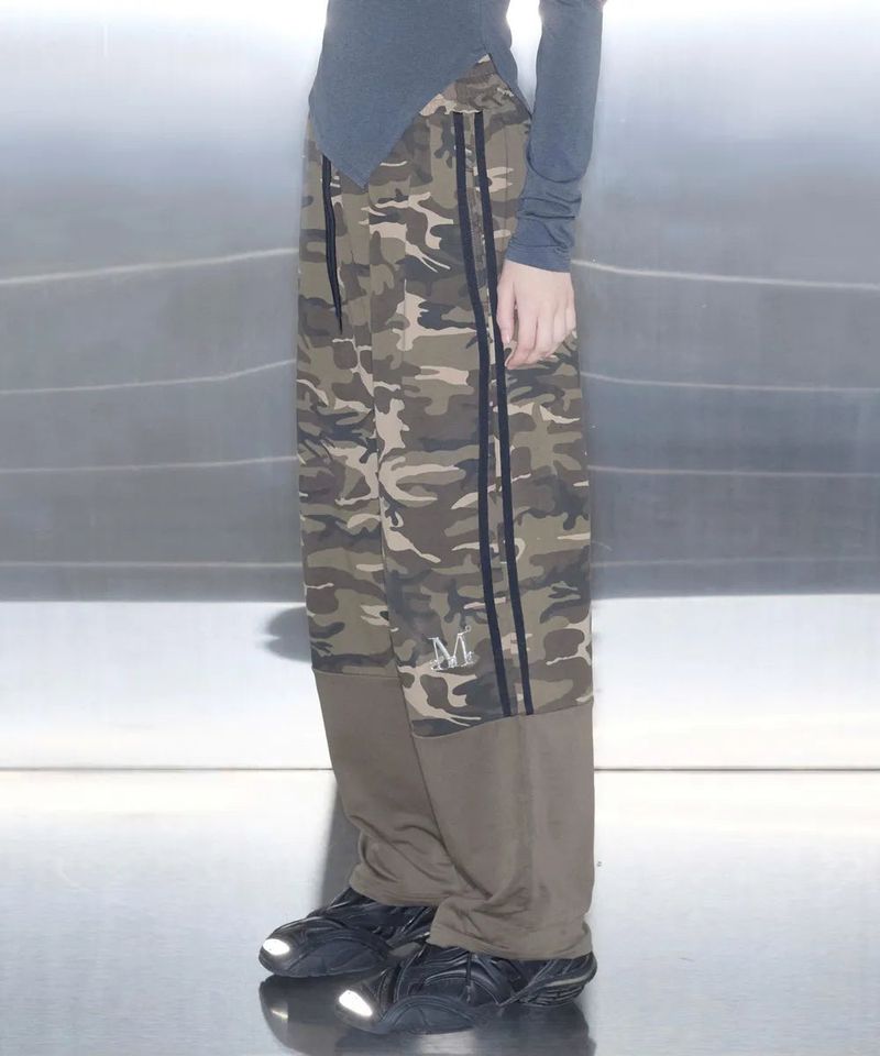 MUCENT（ムセント）の「MOVE SET-UP METAL LOGO CAMO WIDE BANDING PANTS（Pants）」
