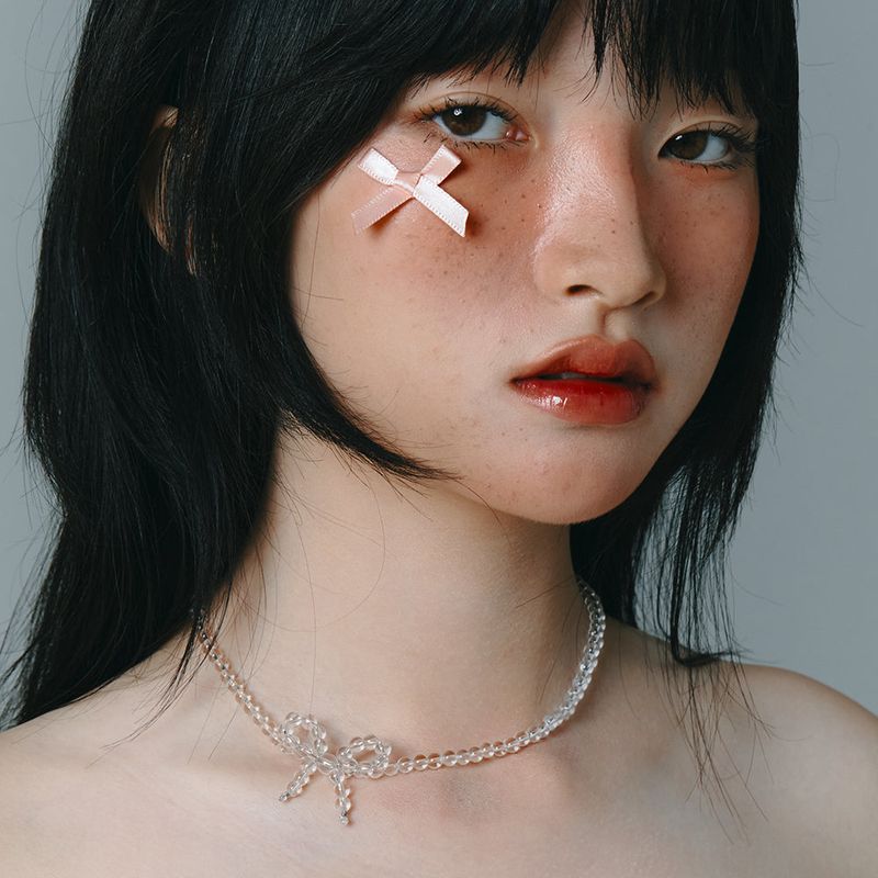 OVT-U（オーブイティーユー）の「[925 SILVER] Crystal Ribbon Necklace（Accessories）」
