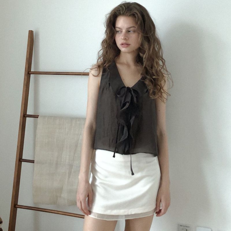 delidi（ディライディ）の「Passionate ruffle blouse (brown)（Tops）」