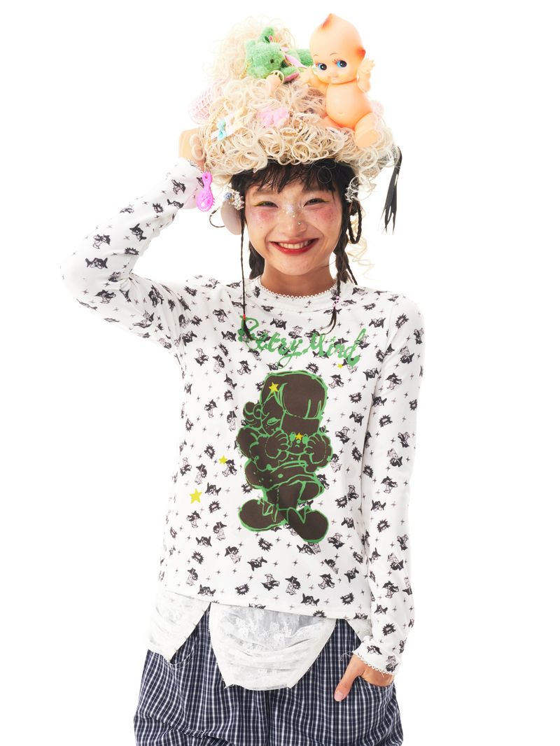 Sillysis（シリシス）の「sillysis 白い花柄プリント伸縮ニット長袖インナー薄手Tシャツ（トップス）」
