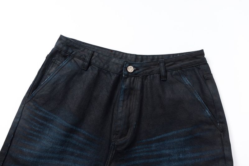 COATED KNIFE-SCRAPED HAND-WIPED DISTRESSED BOOTCUT JEANS