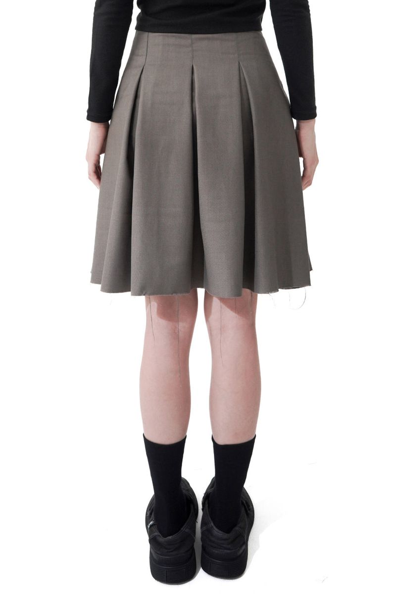  UNTAMED PLEATS SKIRT