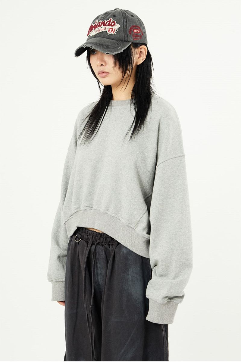 Raucohouse（ラウコハウス）の「Alto bat-wing sleeve crop sweatshirt（Tops）」
