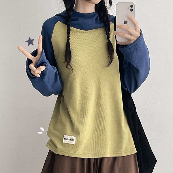 hijjoo（ハイチュー）の「Kring Fingerhole High Neck Raglan Hoodie (4 colors)（Tops）」