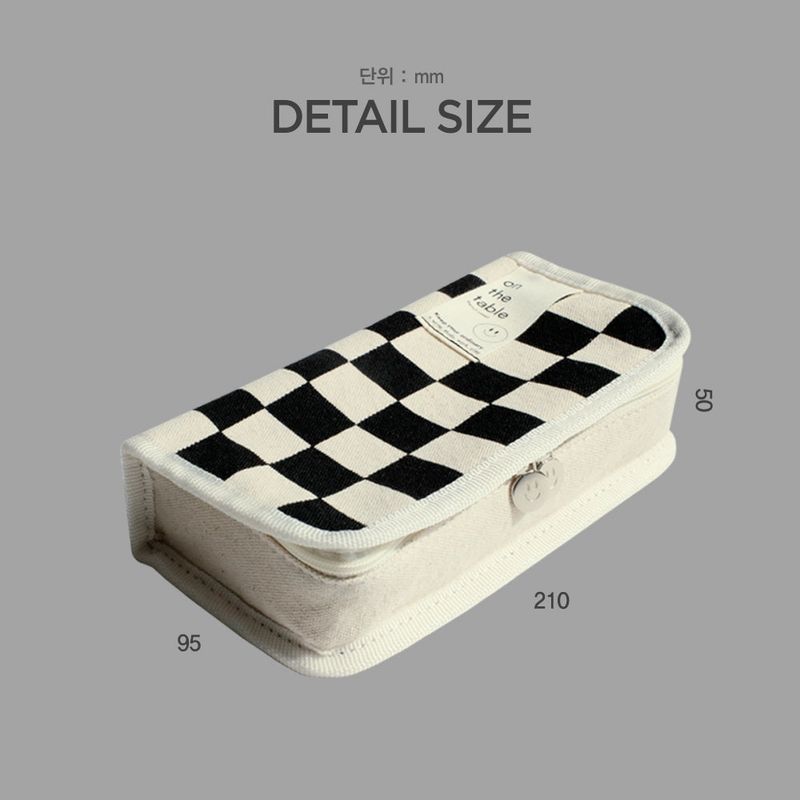 On the table pen case (checkerboard)