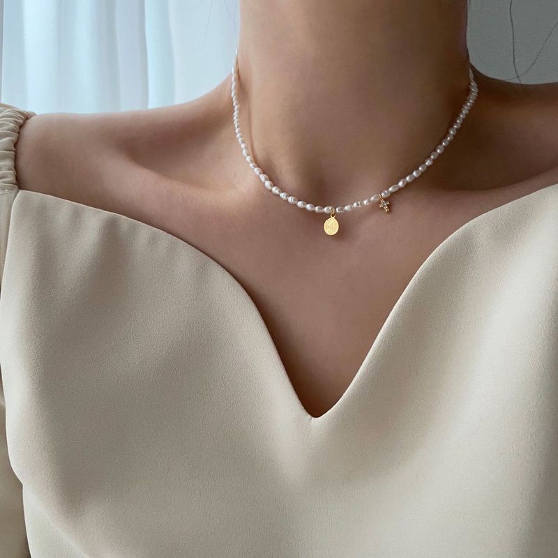 Acer rojo(アセルロジョ)の「daco Silver 925 Fresh Water Pearl Coin Cross Layered Choker Necklace(Accessories)」