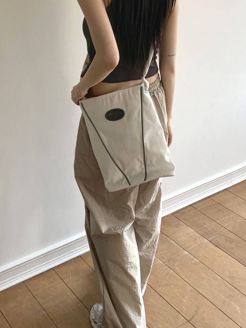 Byten Nylon Snap Button V Logo Crossbody Bag