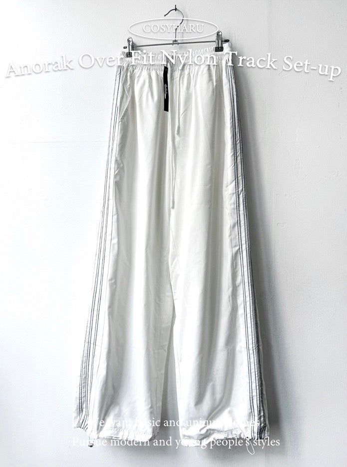 COSYHARU（コシハル）の「Anorak Oversized-Fit Nylon Track Pants（Pants）」