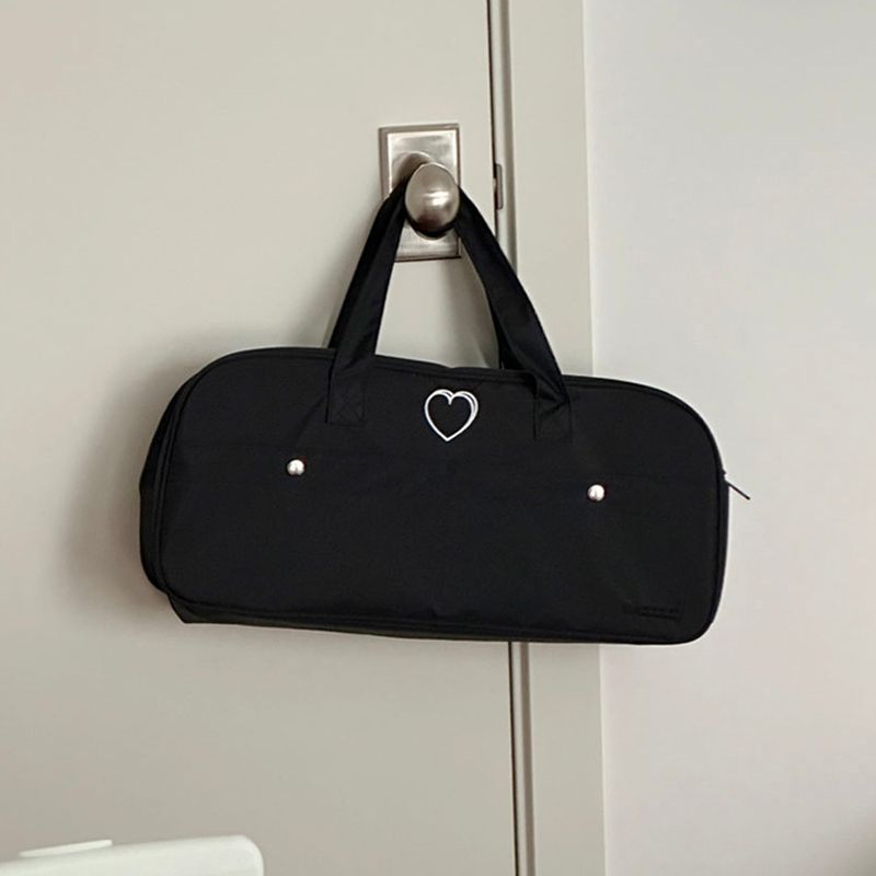 MAZZZZY（マジー）の「signature heart duffel bag（Bags）」