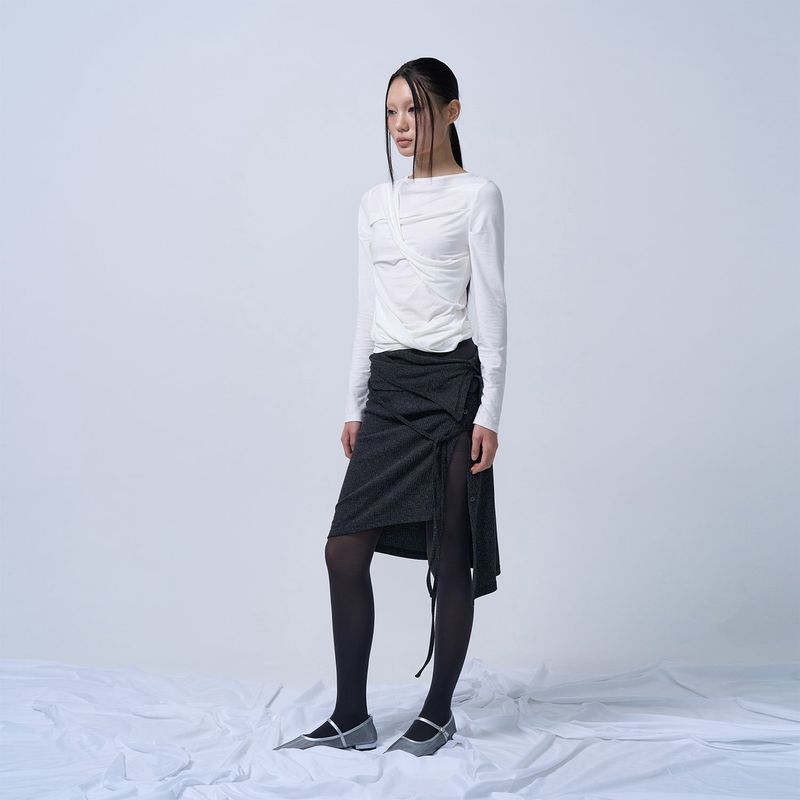 ZIZEMUSEUM（ジゼミュージアム）の「LAYERABLE BUTTON WRAP SKIRT (MELANGE CHARCOAL)（Skirts）」