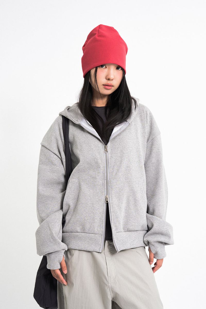 Raucohouse(ラウコハウス)の「Lowell crop fingerhole hood zip-up(Tops)」