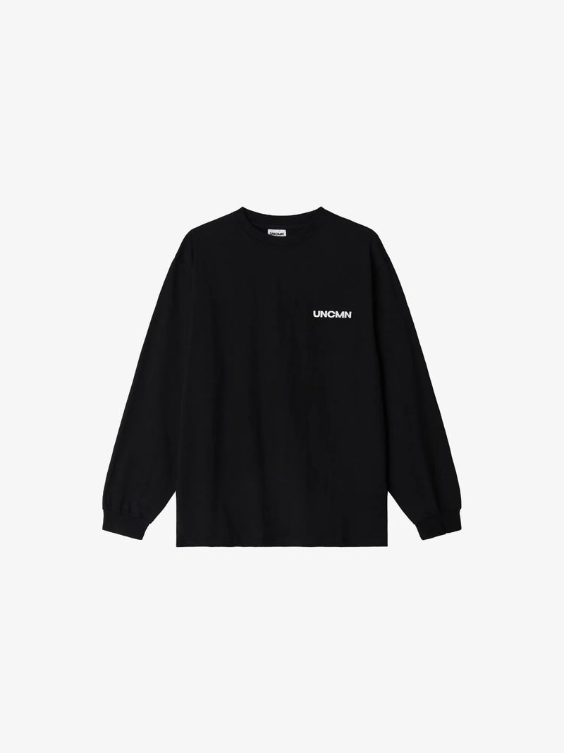 UNCMN（アンカモン）の「ロゴ ロングスリーブ ブラック（トップス）」