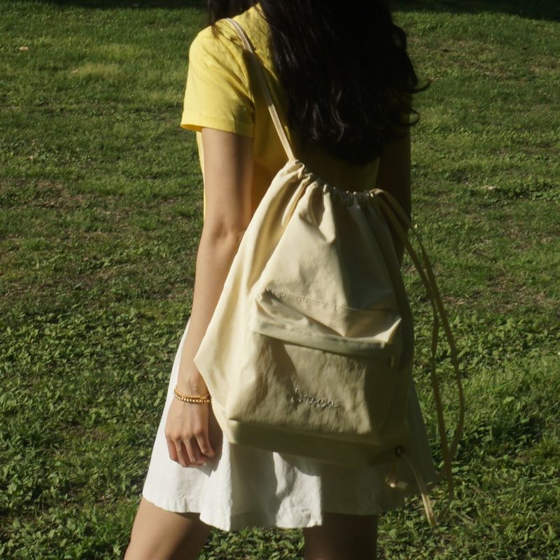 logo nylon string backpack_yellow